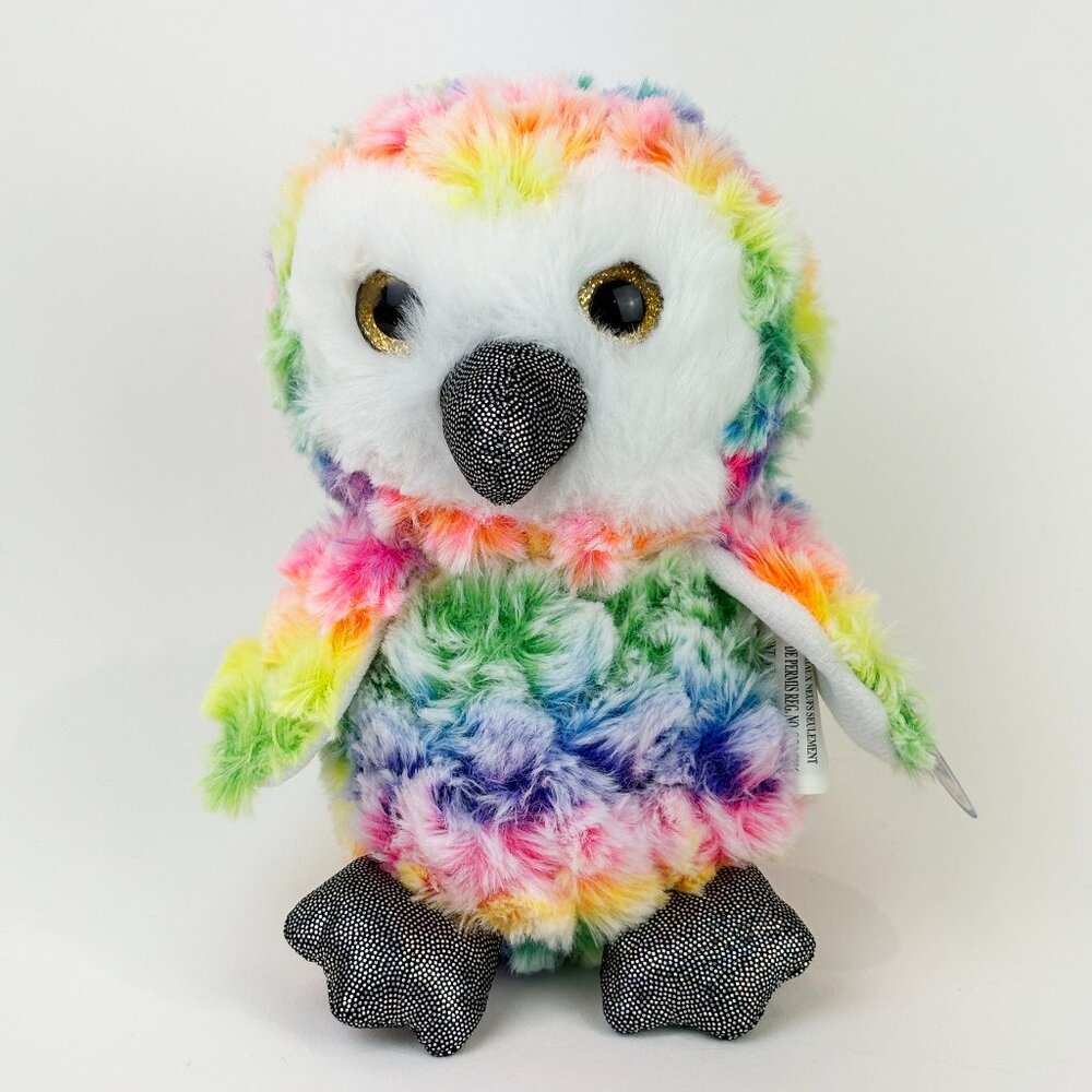Soft and scruffy plush owl with a tie-dye rainbow pride color design